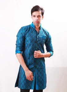 Exhibits Velvet Touch-Up On The Collar Brocade Blue Indo Western Kurta Pajama