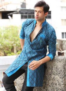 Exhibits Velvet Touch-Up On The Collar Brocade Blue Indo Western Kurta Pajama