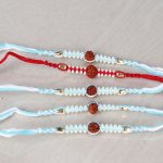 Impressive Rudraksha with Tiny Pearl Beads Rakhi